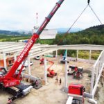 Kran auf Baustelle - Henneberger schwerlast Kranvermietung und Schwertransport