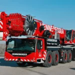 roter Mobilkran LIEBHERR LTM1300-6.3 mit Henneberger-Schriftzug: Erweiterung Fuhrpark Kranarbeiten
